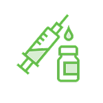 A syringe next to a bottle of liquid, indicating a medical or laboratory setting for injections or samples.