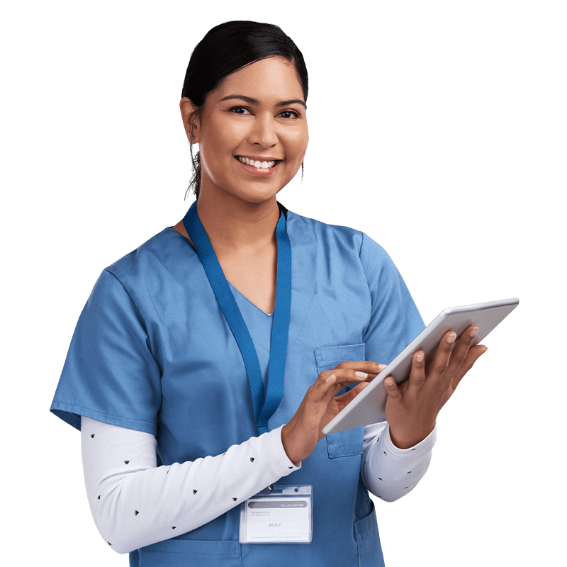 A male doctor in a white coat holding a tablet computer, looking at the screen with a focused expression.