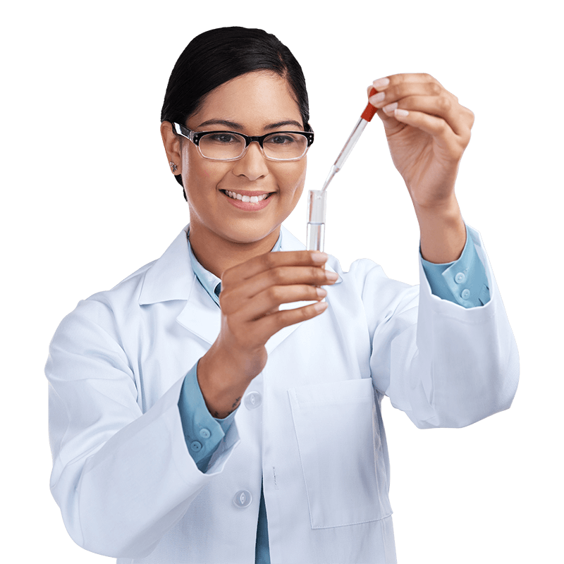 A male doctor in a white coat holding a tablet computer, looking at the screen with a focused expression.