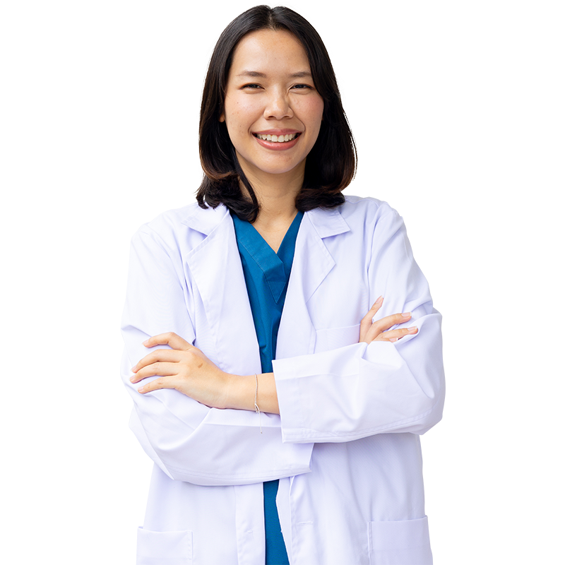 A male doctor in a white coat holding a tablet computer, looking at the screen with a focused expression.