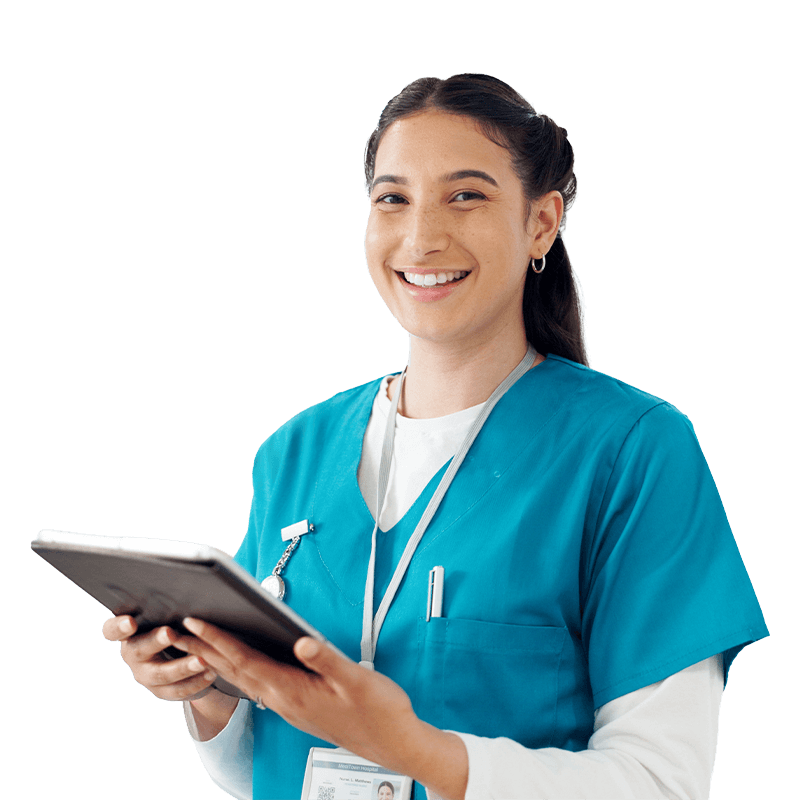 A male doctor in a white coat holding a tablet computer, looking at the screen with a focused expression.
